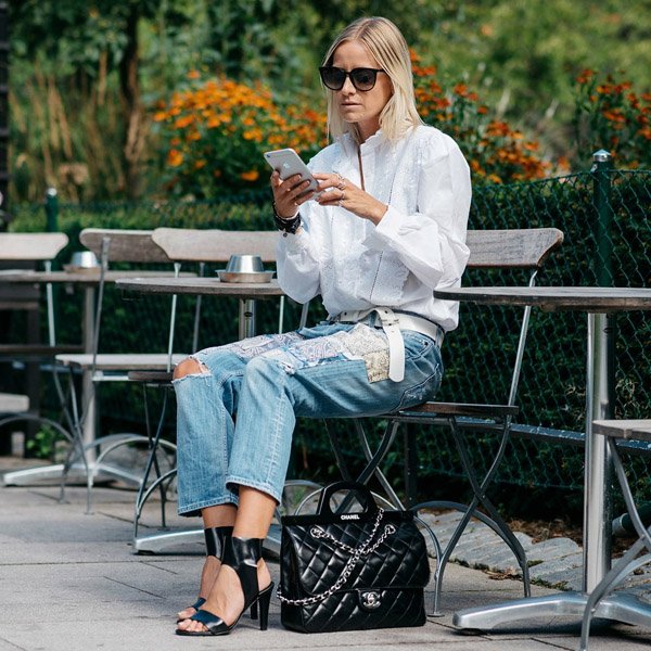 destroyed-jeans-chanel-bag-white-blouse-street-style