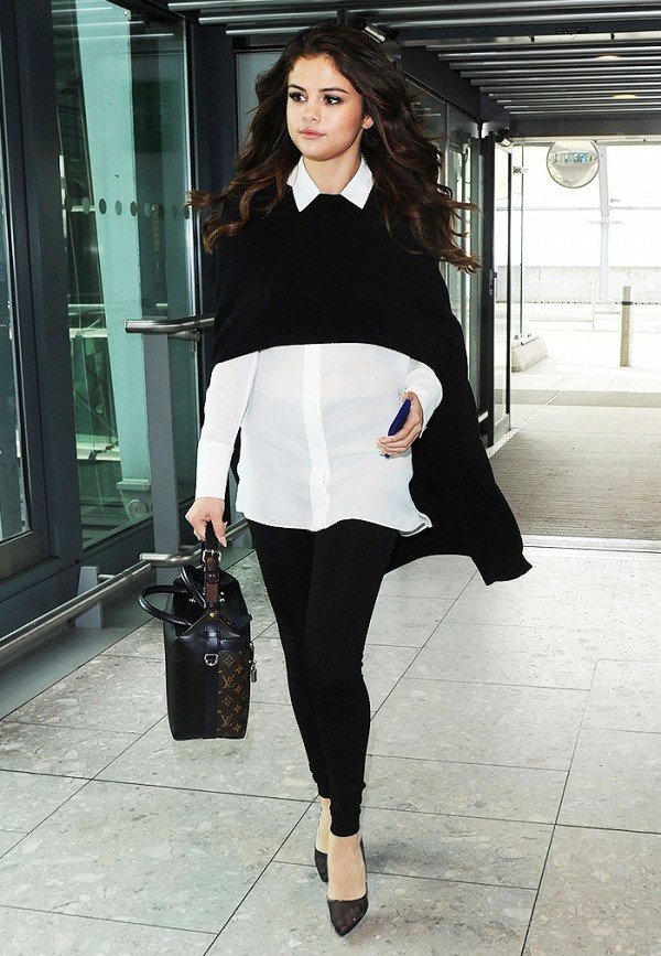Selena Gomez black and white airport look