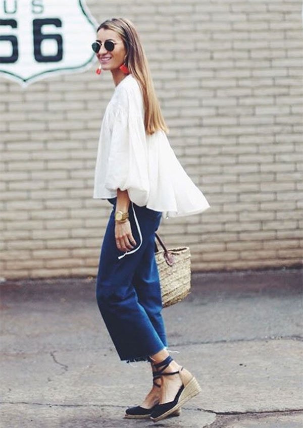 Street style look com calça culotte.