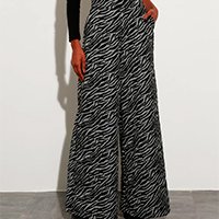 calça wide pantalona de jacquard estampada animal print zebra com bolsos cintura super alta mindset preta