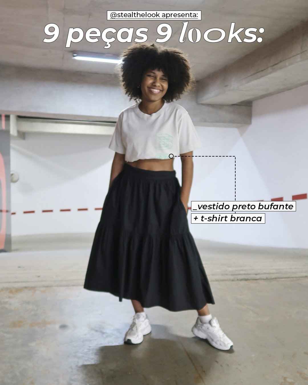 Clau Ribeiro - saia midi preta, t-shirt branca e tênis esportivos - looks básicos - inverno - mulher negra em pé sorrindo em uma garagem - https://stealthelook.com.br