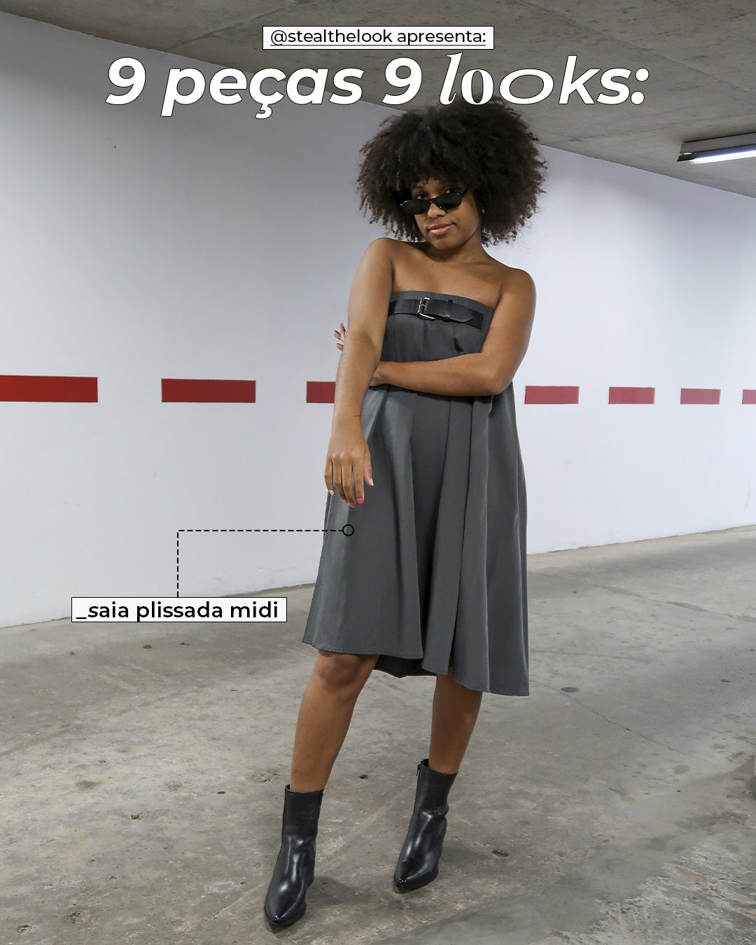 Clau Ribeiro - saia midi cinza plissada e bota preta - looks básicos - inverno - mulher negra em pé em uma garagem - https://stealthelook.com.br