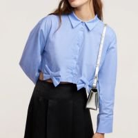 Camisa Cropped em Tricoline com Laços na Barra Azul