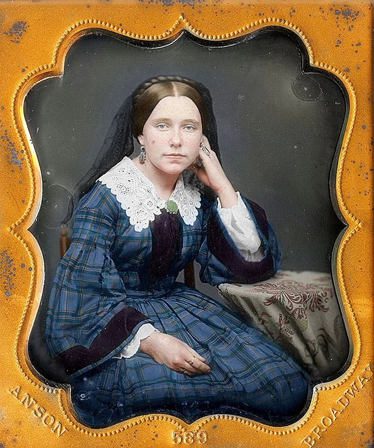 Daguerreotype photograph c.1853-1856 of a woman wearing what looks like an early Irish crochet collar, 

colorized by Frédéric Duriez