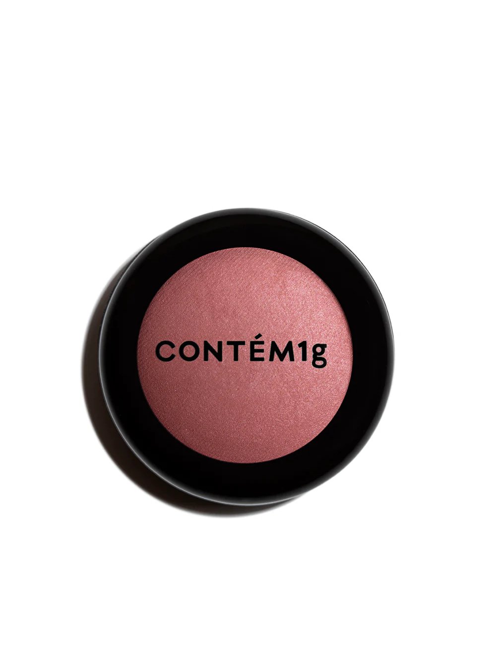 Blush rosado em embalagem circular preta, similar a dupes de beleza populares.
