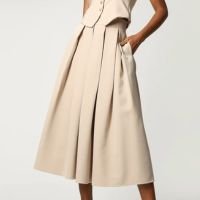 Saia Com Pregas Em Alfaiataria - AREIA