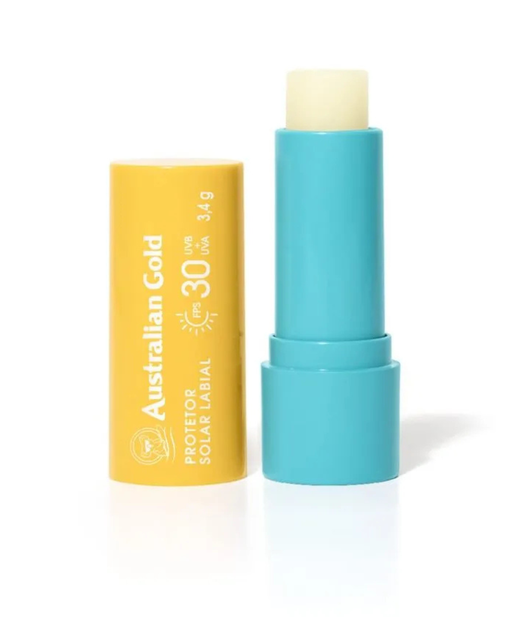 Protetor labial da Australian Gold com FPS 30, embalagem azul e amarela, 3,4g.
