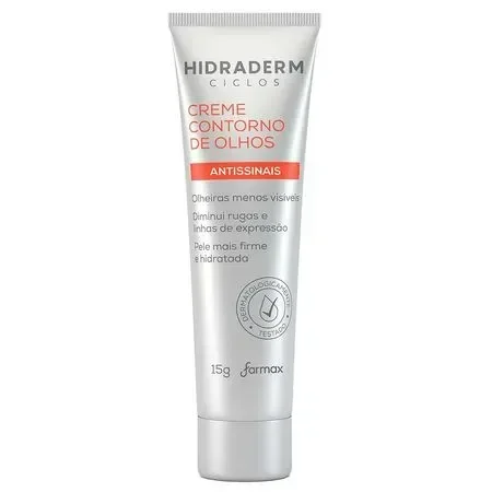 O creme para área dos olhos Hidraderm Ciclos, em tubo prateado, possui 15g e é formulado para diminuir olheiras, rugas e linhas de expressão. Com propriedades antissinais, promete deixar a pele mais firme e hidratada. Ideal para integrar a rotina de cuida