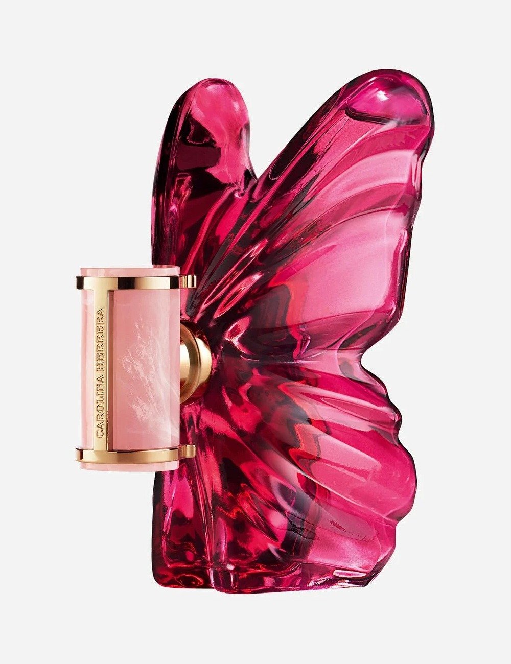 Fragrância Carolina Herrera em frasco rosa translúcido com design de asa de borboleta em vidro vermelho vibrante, elegante