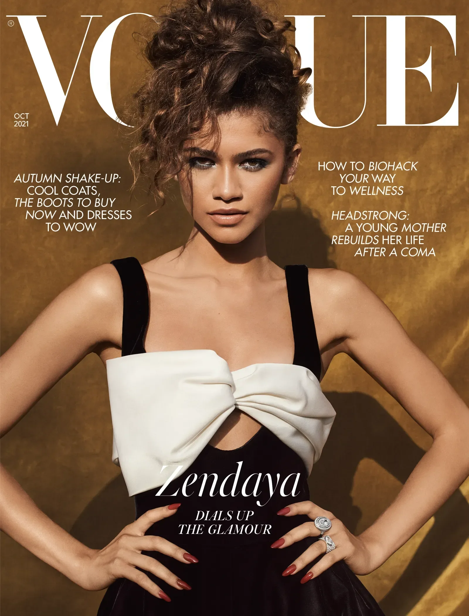 Looks da Zendaya: modelo posa em vestido preto com laço branco escultural e glamour marcante.